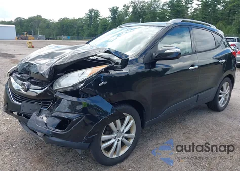 2010 Hyundai Tucson Limited z USA, uszkodzony, nr VIN KM8JUCAC0AU047182
